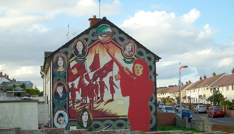 Various women in the Irish Republican Army that died during The Troubles painted on the side of the building.