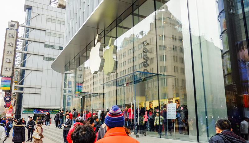 People in front of the Apple Store in Shanghai, China