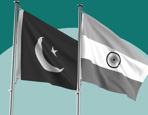 black-and-white depiction of the India and Pakistan flags against a two-tone green background